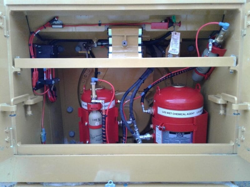 Fire suppression system on heavy equipment